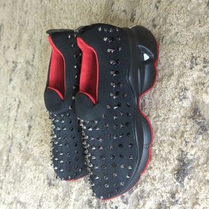 C L studded sneakers
